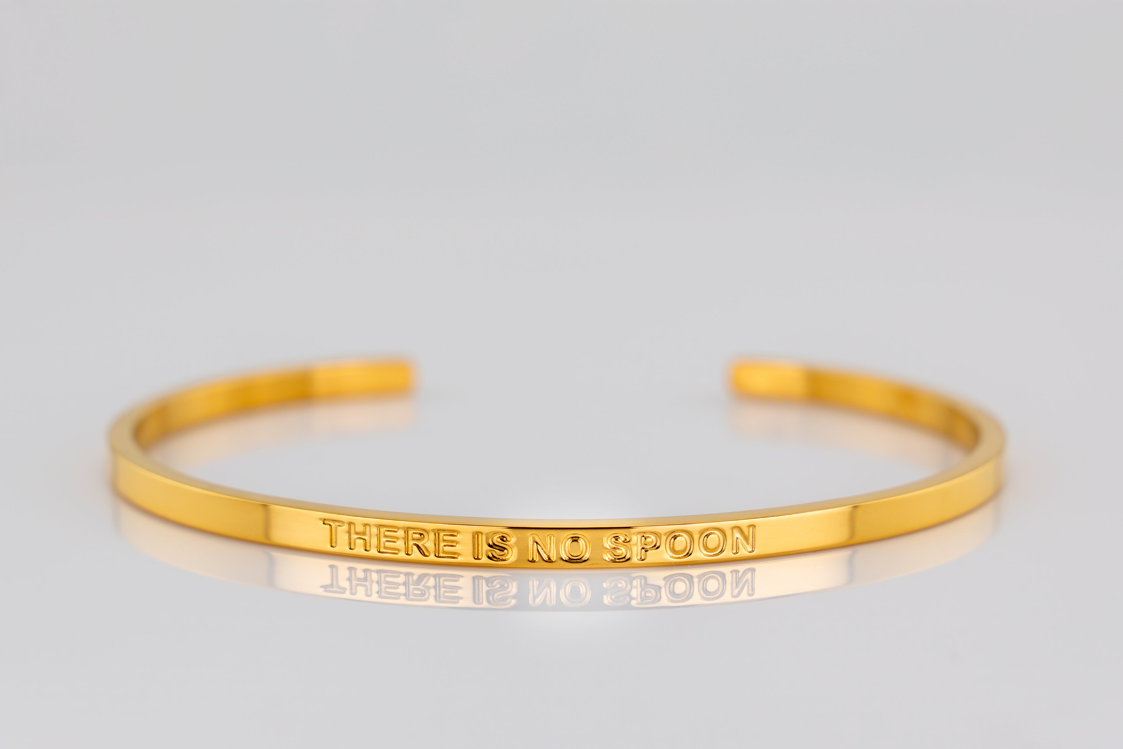 "THERE IS NO SPOON" cuff bracelet