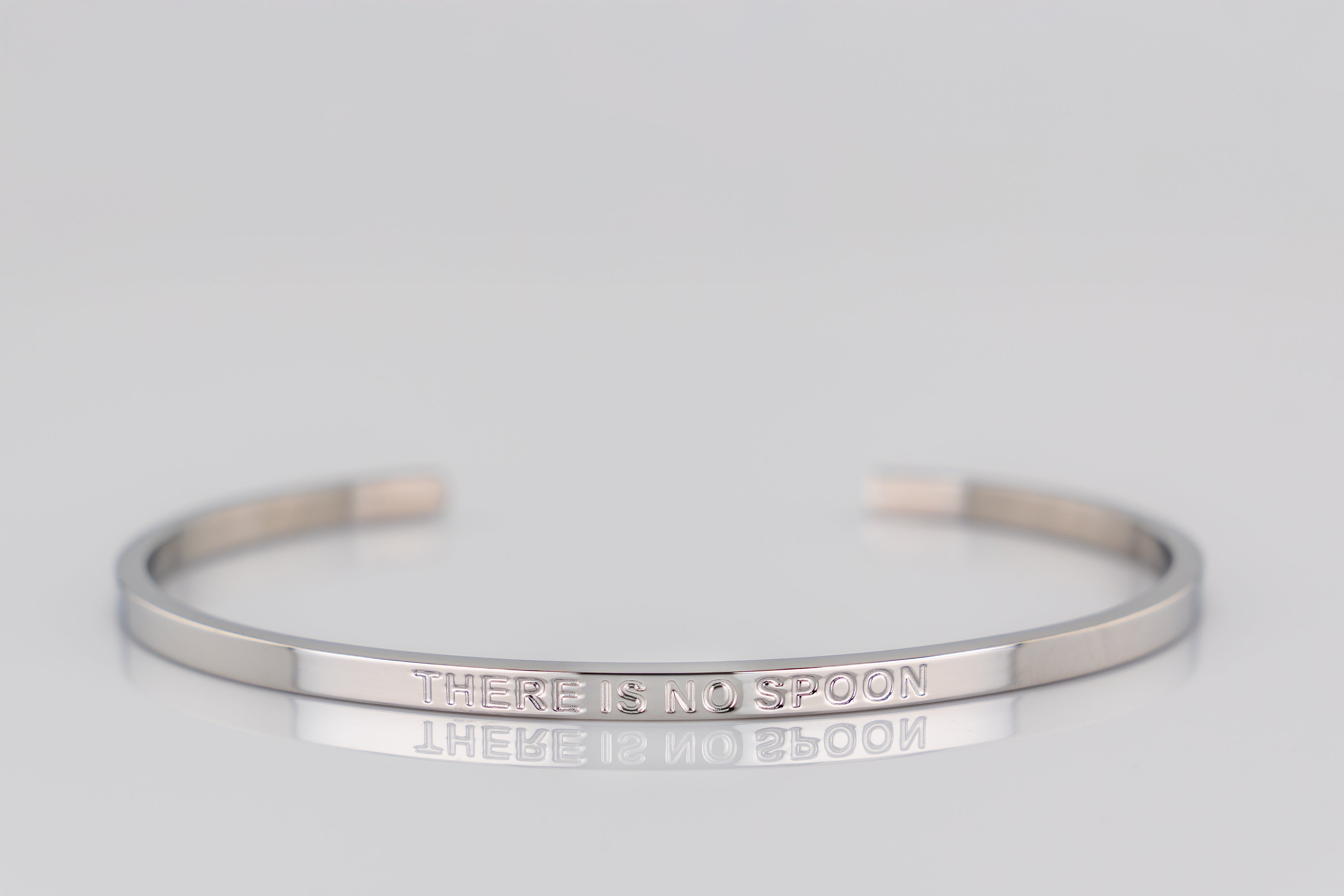 "THERE IS NO SPOON" cuff bracelet