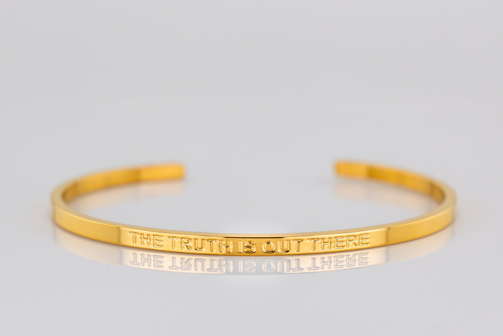 "THE TRUTH IS OUT THERE" cuff bracelet