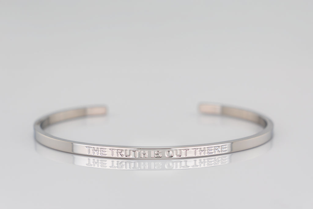 "THE TRUTH IS OUT THERE" cuff bracelet