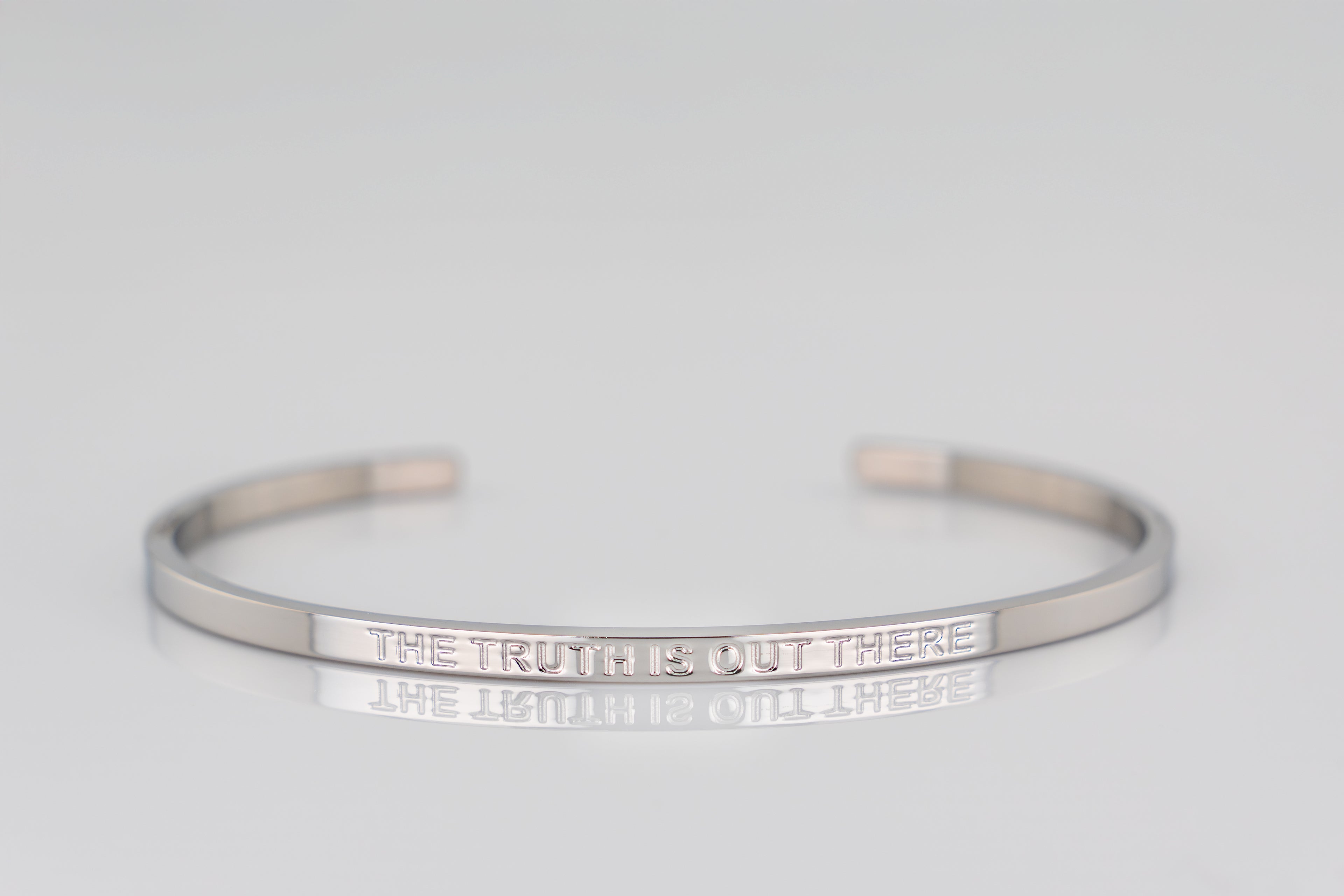 "THE TRUTH IS OUT THERE" cuff bracelet